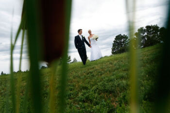 bride and groom walk together