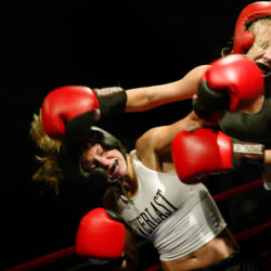 Female Boxers duke it out at College Fight Night at the Fox Theater in Boulder, Colo. The event also featured men’s lightweight, middleweight and heavyweight boxing and midget boxing.