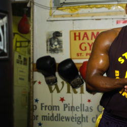NIgerian native Akinyemi Laleye fights under the name "AK-47." boxer taping his hands