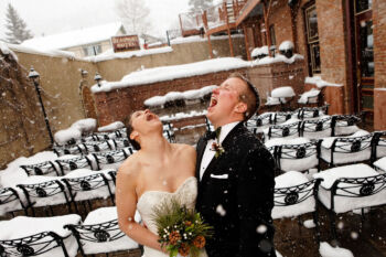 bride and groom in the snow