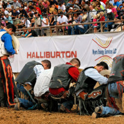 West Slope Colorado Oil and Gas Association's annual Bull Ride 'n' BBQ. Bull Riders praying