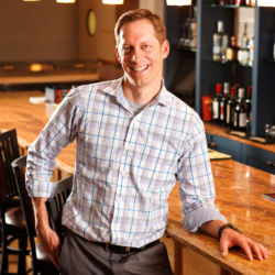 Restaurant manager Justin Thompson at The Creekside in Montrose, Colorado. restaurant manager