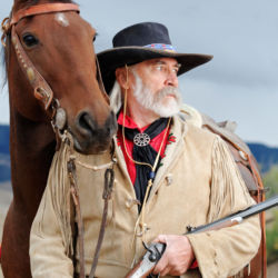 Dan Deuter with his horse Quigley at his home near Montrose, Colorado. a cowboy and his horse