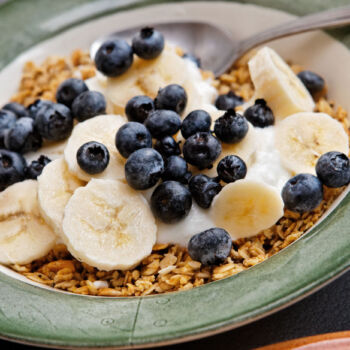 Homemade Granola with bananas and blueberries