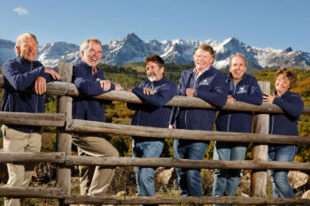 board members in front of the san juan mountains