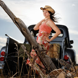 Dawn Daley models her country style in Montrose, Colorado. woman with vintage truck