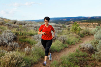 woman running on a trail