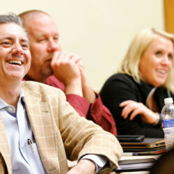 people laugh in a meeting