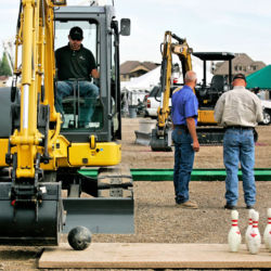 Public Works Employees of the Salt Lake Valley annual Dig Off. playing games with a back hoe
