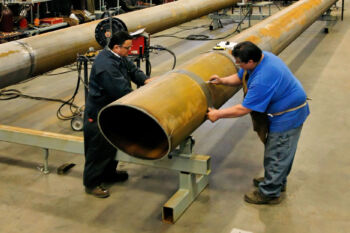 men building a lift tower